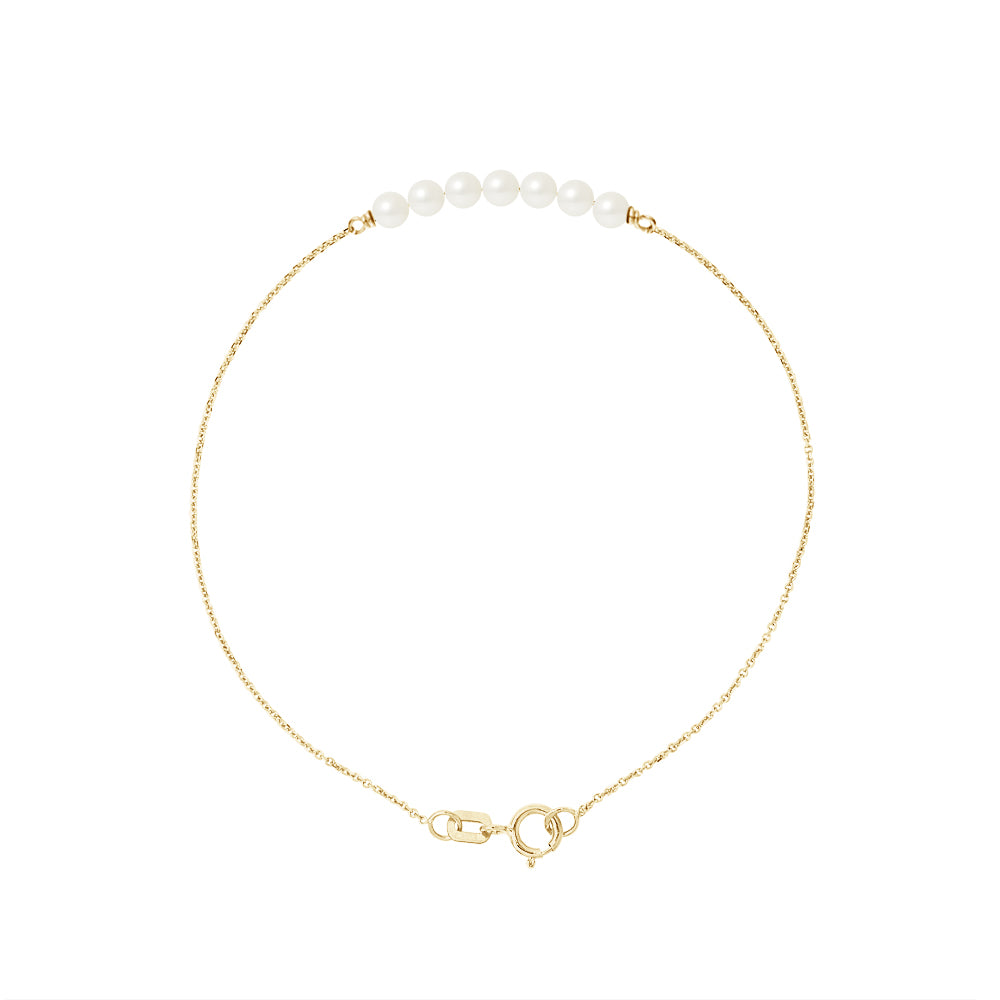 un bracelet en perles avec un fermoir en or