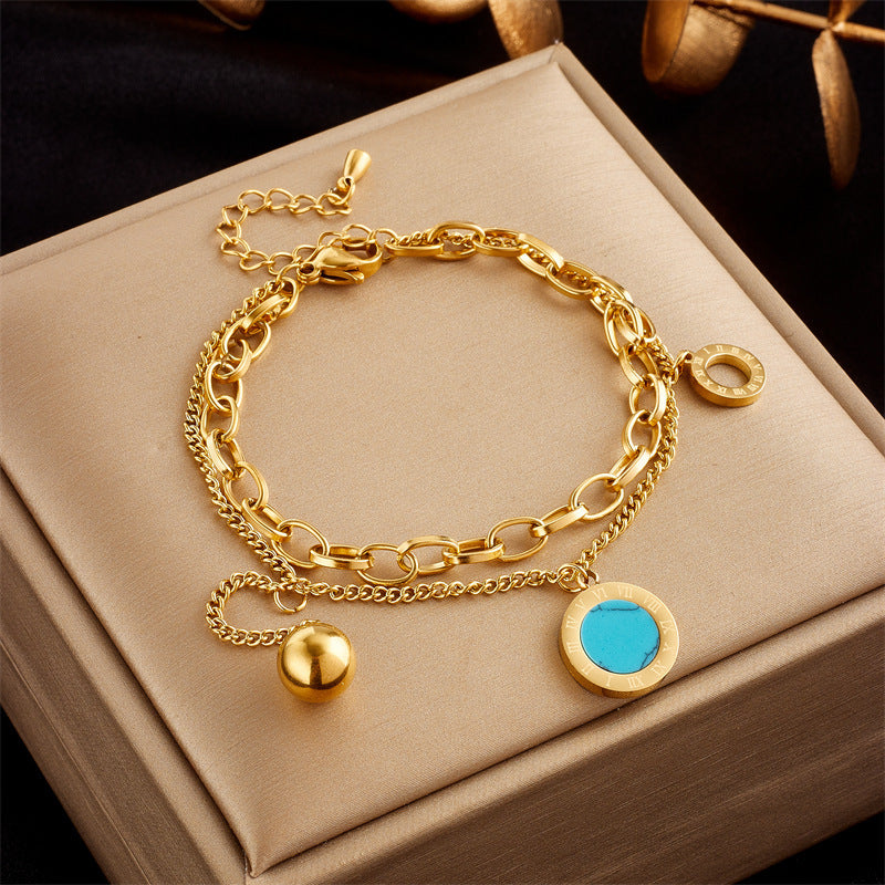 Bracelets Oikos - Acier Titane plaqué or