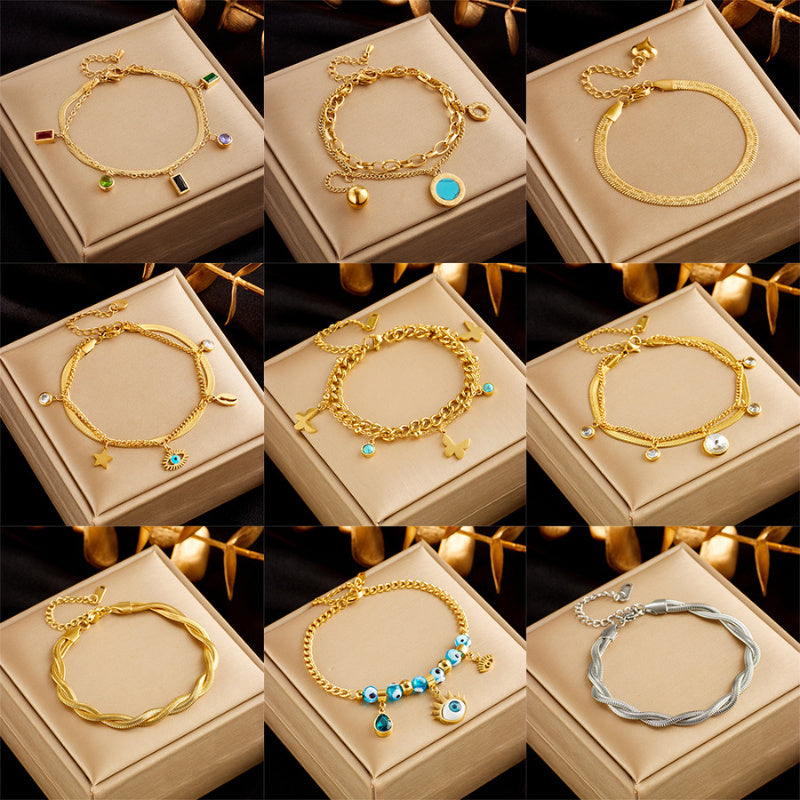Bracelets Oikos - Acier Titane plaqué or