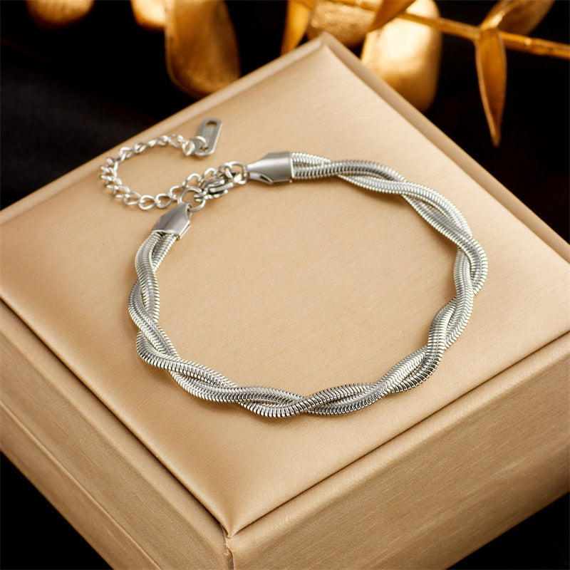Bracelets Oikos - Acier Titane plaqué or