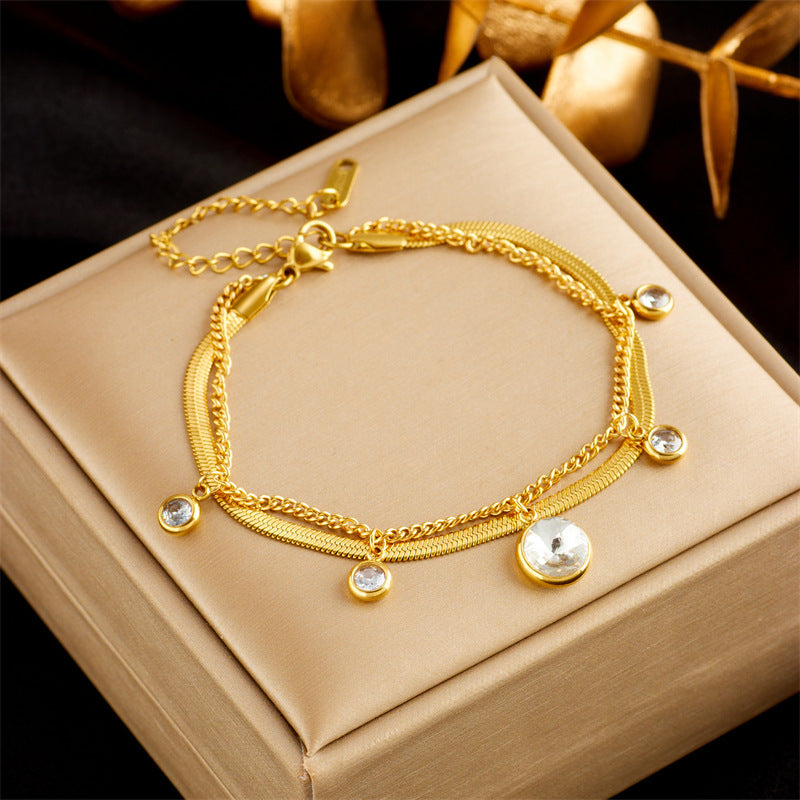 Bracelets Oikos - Acier Titane plaqué or