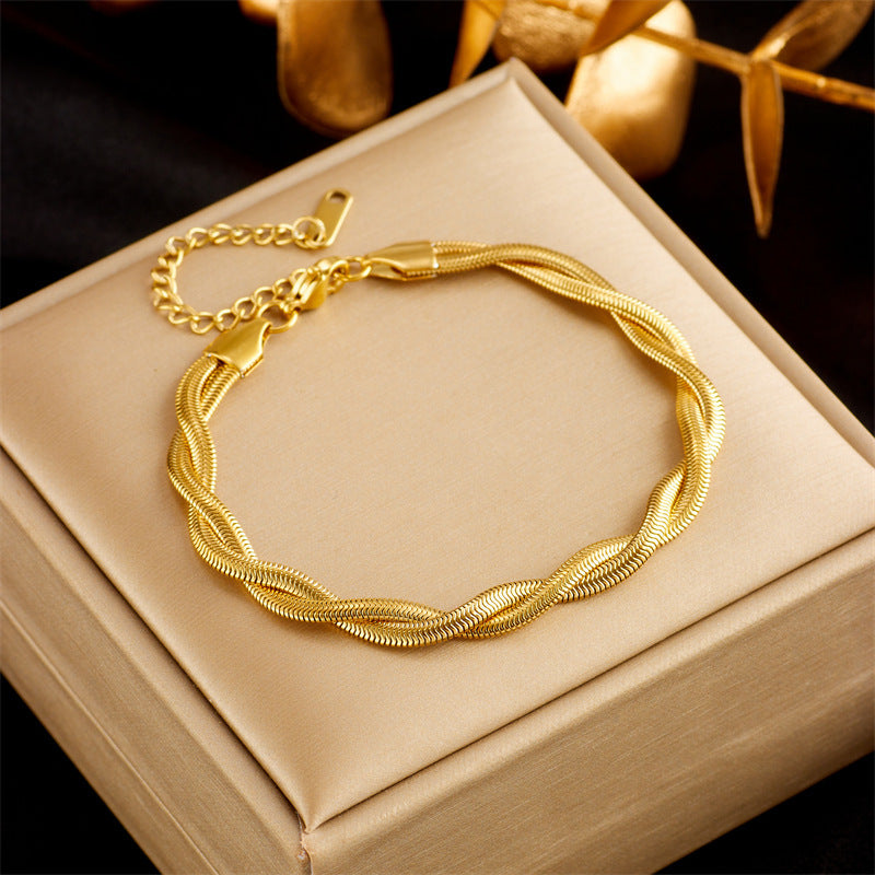 Bracelets Oikos - Acier Titane plaqué or