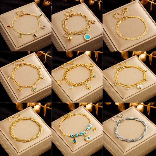 Bracelets Oikos - Acier Titane plaqué or
